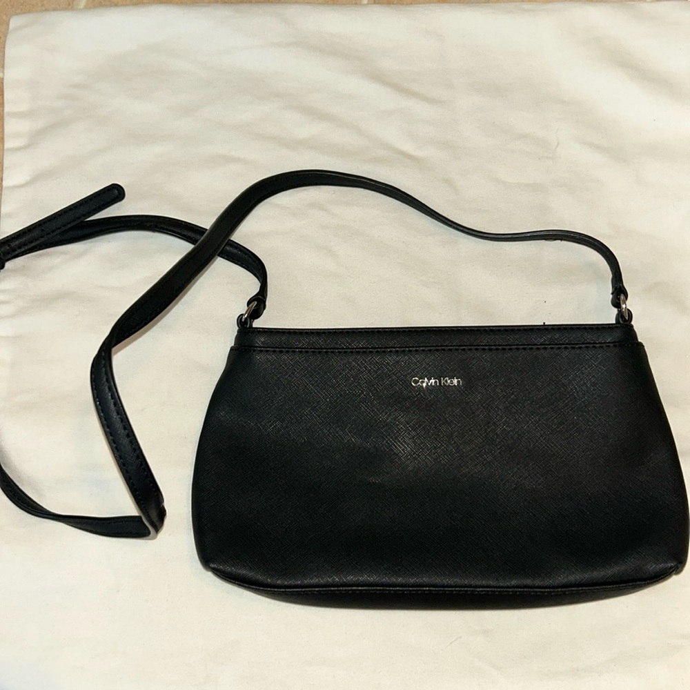 Black Calvin Klein pocket book.